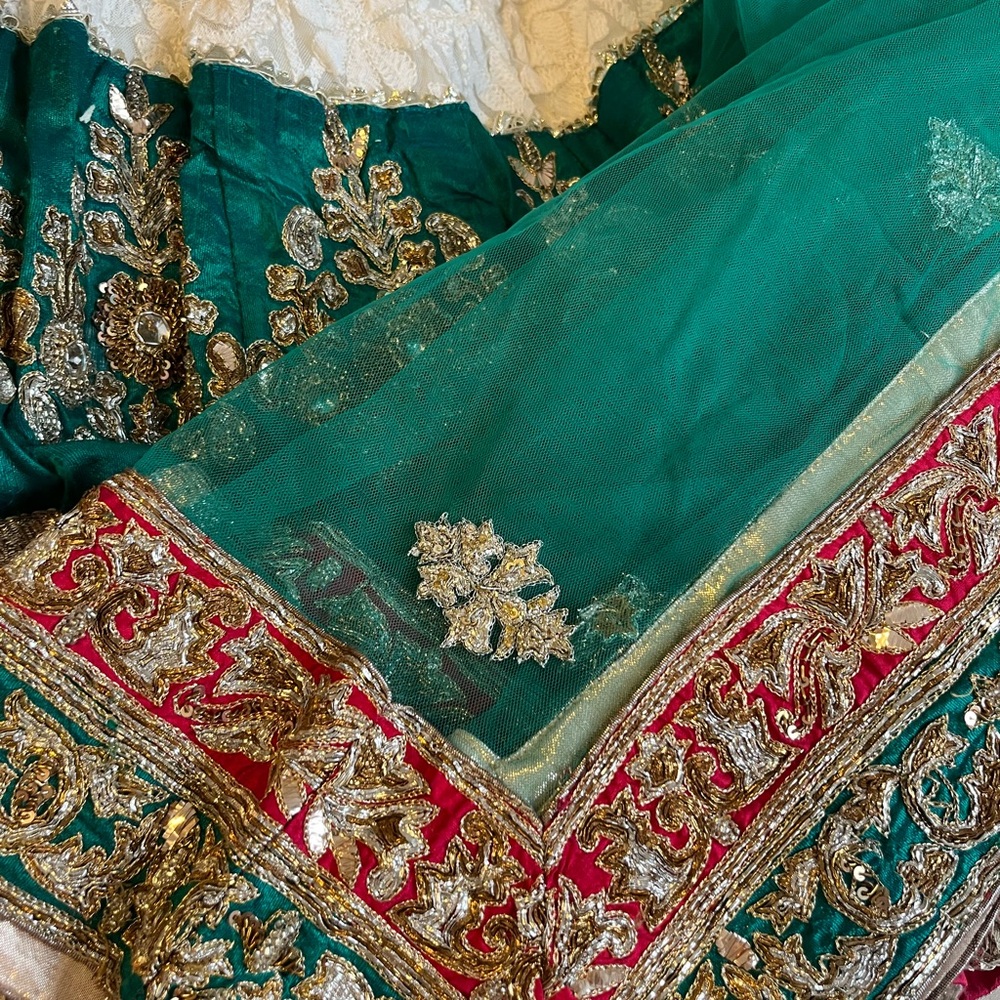 Elegant Teal and Gold Embroidered lehenga